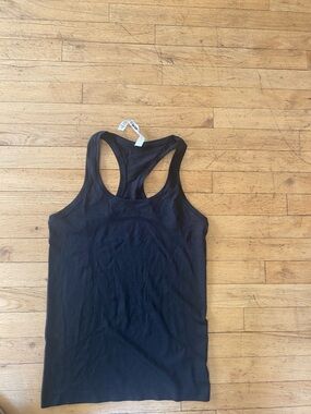 Lulu lemon black racer back tank top. Size 6